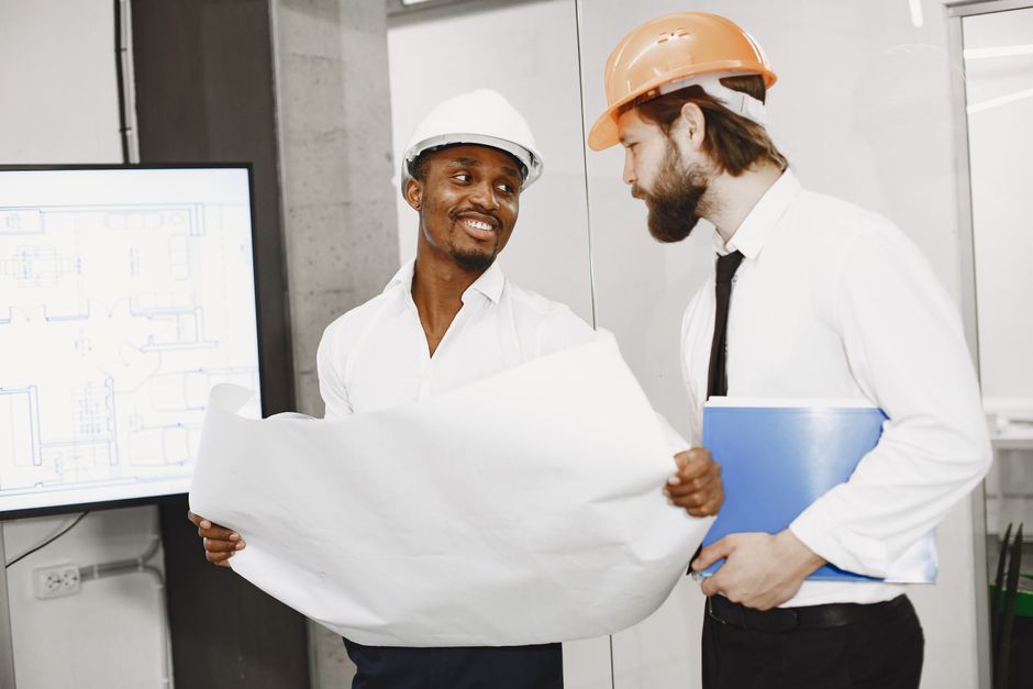 Contractor reviewing building plans